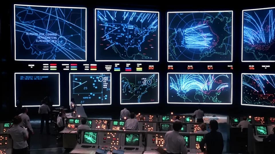 Still from WarGames illustrating WOPR Plays for Real