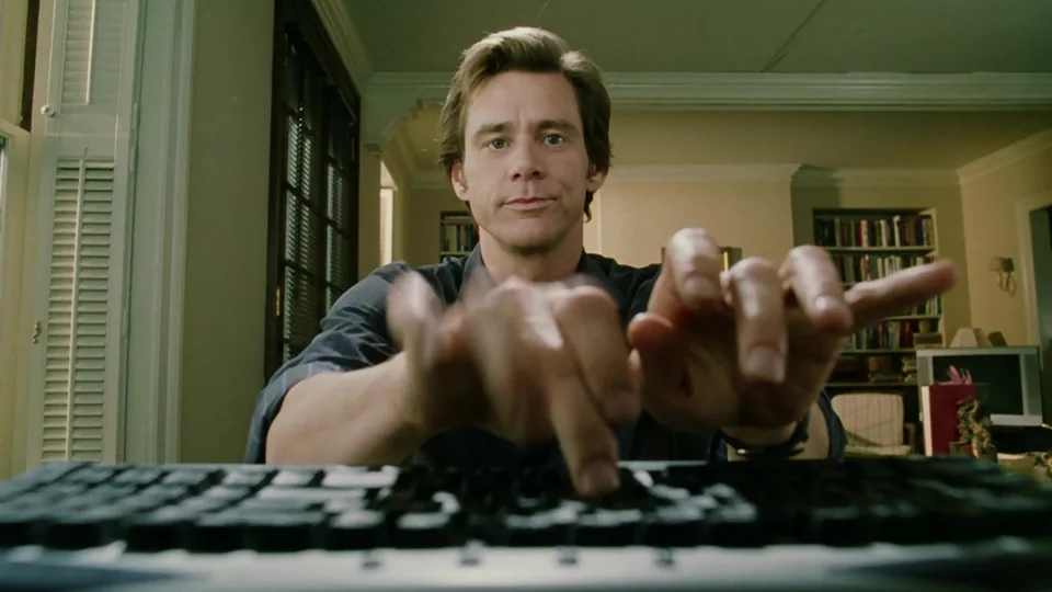 Still from Bruce Almighty illustrating Bruce Says “Yes to All”