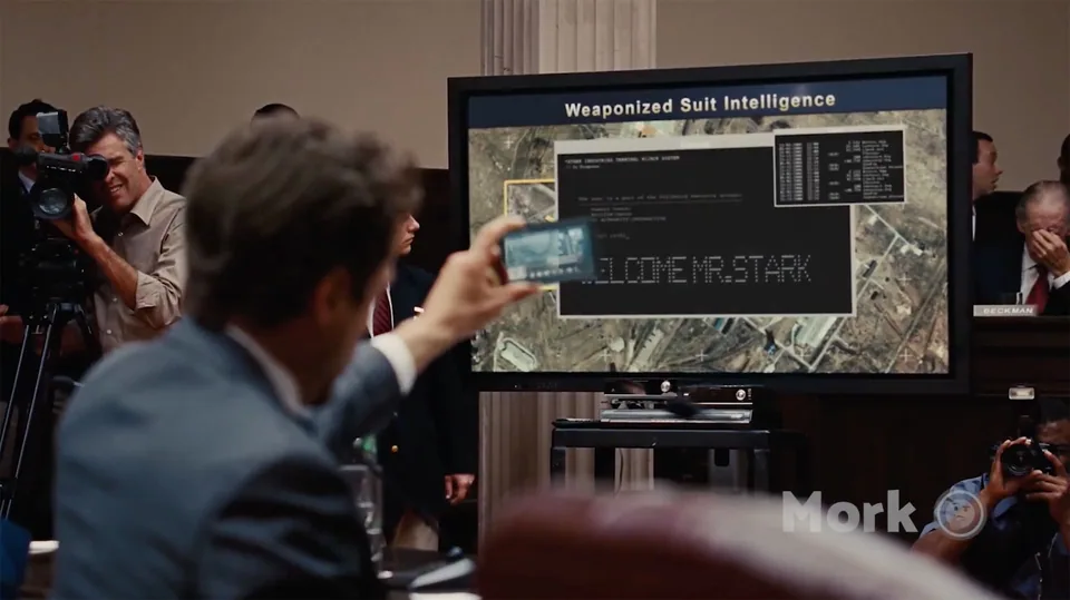 Still from Iron Man 2 illustrating Tony Hijacks His Own Oversight Hearing