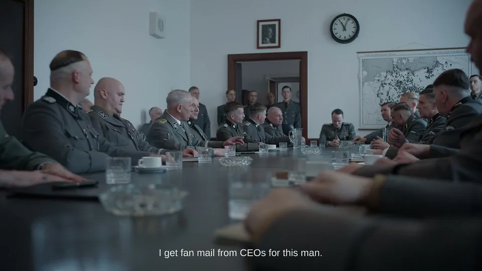 Still from The Zone of Interest illustrating Promoted for Hitting Labor Targets