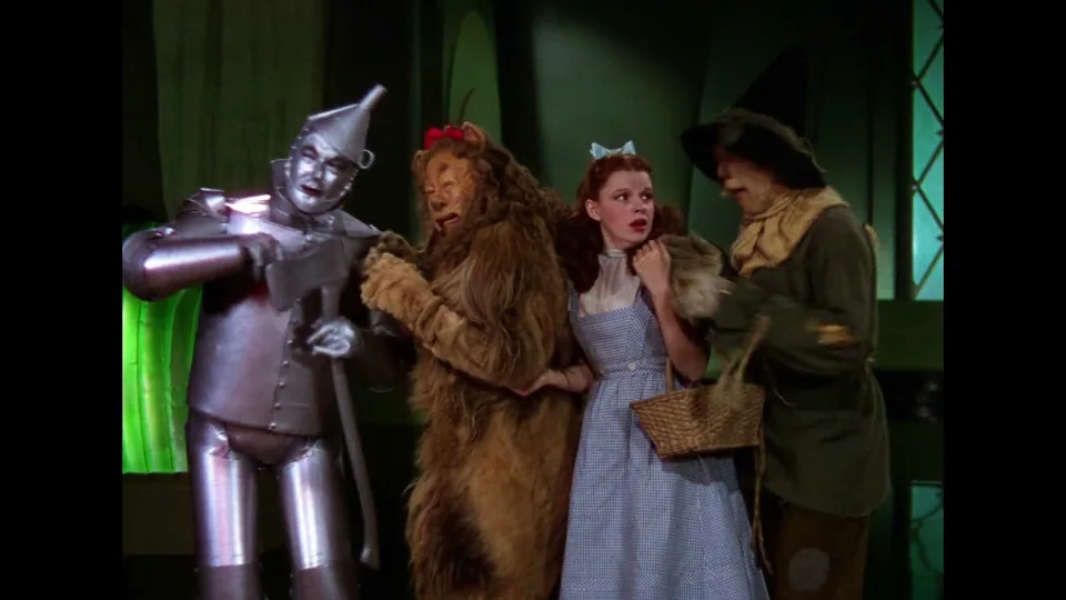 Still from The Wizard of Oz illustrating Toto Pulls Back the Curtain