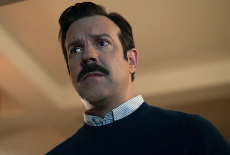 Still from Ted Lasso illustrating Nate Leaks Ted’s Panic Attack