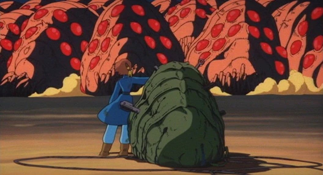 Still from Nausicaä of the Valley of the Wind illustrating The Injured Baby Ohmu